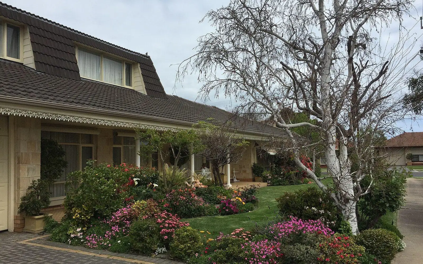 Brick Australian family home with established garden